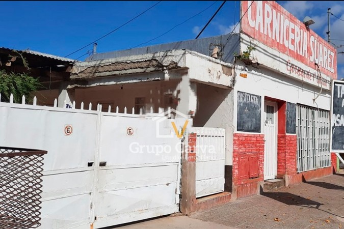 Casa con local comercial