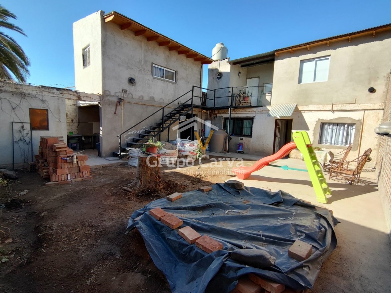 Casa con departamentos