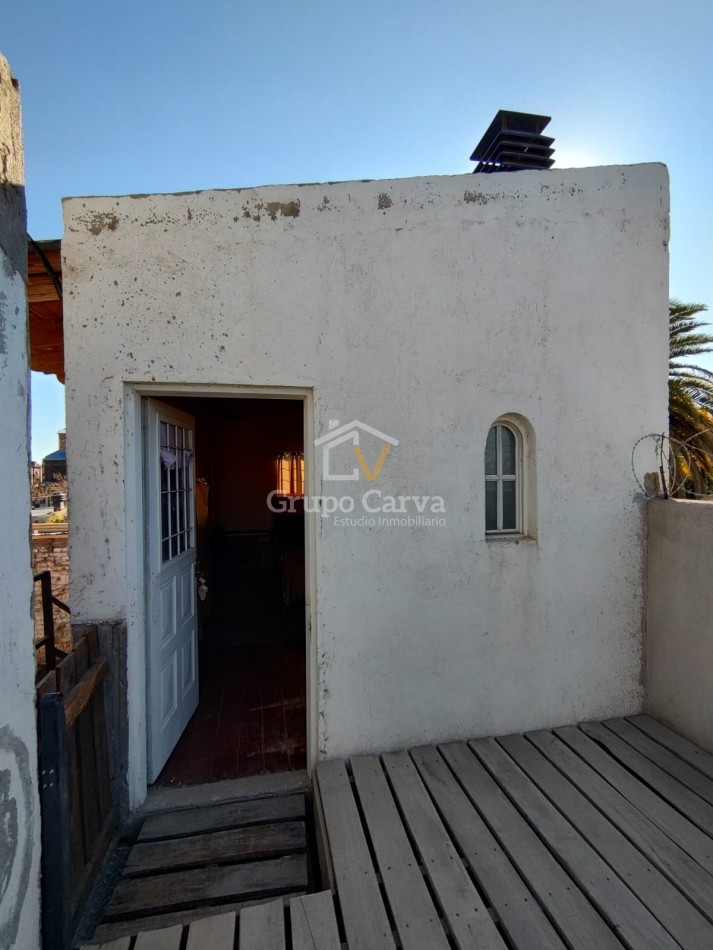 Casa con departamentos